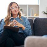 Counseling, therapy and woman therapist talking to client in a consultation or counseling conversat
